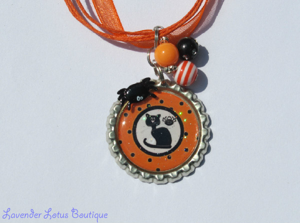Black Cat Halloween Necklace with Beads-necklace, bottlecap, cat, black cat, Halloween, orange, beaded, bottlecap necklace, Halloween necklace, black cat necklace, beaded Halloween necklace, spider necklace, handmade necklace, custom necklace, unique necklace, holiday necklace, kids necklace, kids jewelry, fun necklaces, unique necklaces, bling beads, acrylic beads, Halloween gift